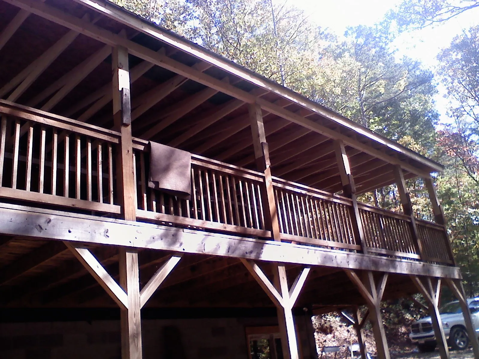 Timber framing under a new elevated porch and deck — Roof Leak Repair in Beaver Creek by Roofing Brothers